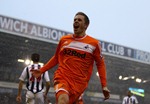 WEST BROMWICH, ENGLAND - FEBRUARY 04:  Gylfi Sigurdsson of Swansea celebrates scoring his teams first goal during the Barclays Premier League match between West Bromwich Albion and Swansea City at The Hawthorns on February 4, 2012 in West Bromwich, England.  (Photo by Julian Finney/Getty Images)