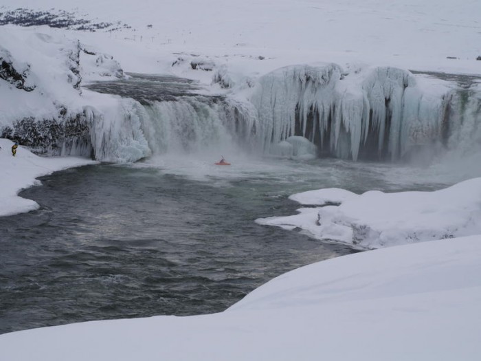 Singer Songwriter Descends Down Icy Waterfall